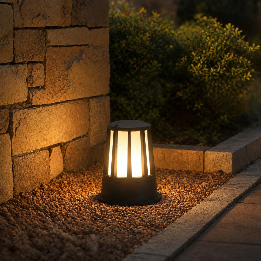 Aely Cylindrical Cone Bollard Light in a natural lifestyle setting