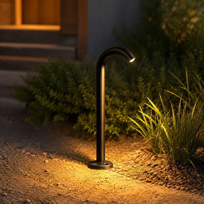 Aqen Curved Neck Bollard Light in a natural lifestyle setting