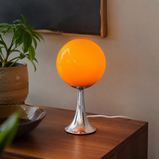 Bina Globe Trumpet Table Lamp in a natural lifestyle setting