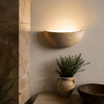 Cyri Semi Bowl Travertine Wall Light in a natural lifestyle setting